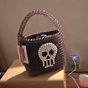 bouffants and broken hearts crossbody skull bag
